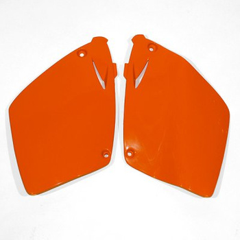 UFO BOCZKI TYLNE KTM 2T '98>, 4T '00> KOLOR POMARAŃCZOWY